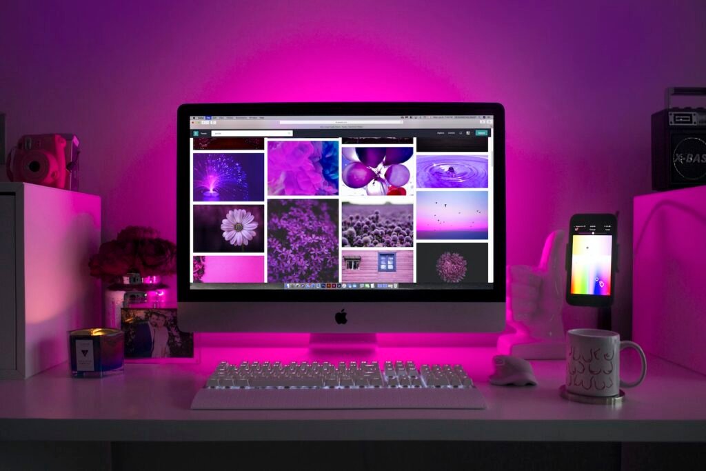 Web Design Trends to Watch in 2023: Stay Ahead of the Curve 5 Silver Imac Displaying Collage Photos